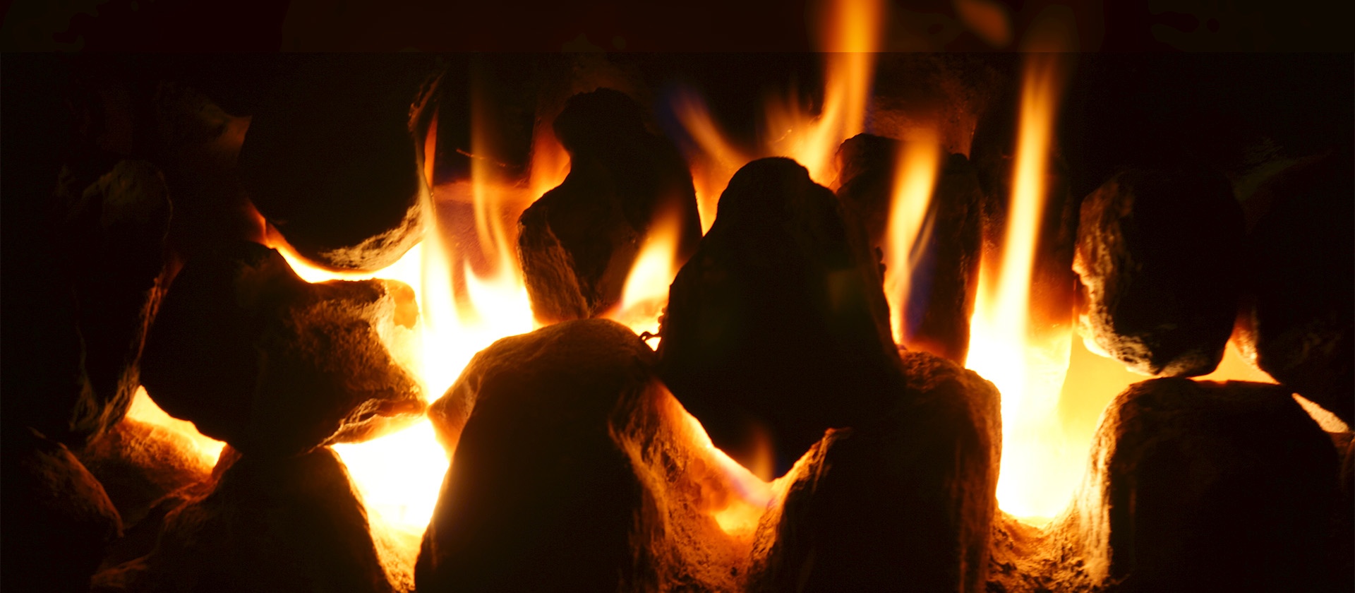 Gas fire burning on ceramic coals